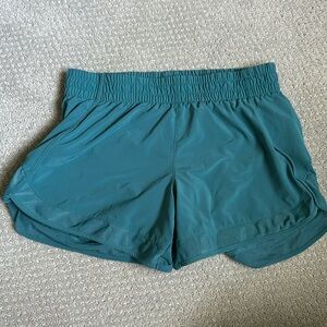 Athleta Mesh Racer Run Mid Rise 4” Shorts